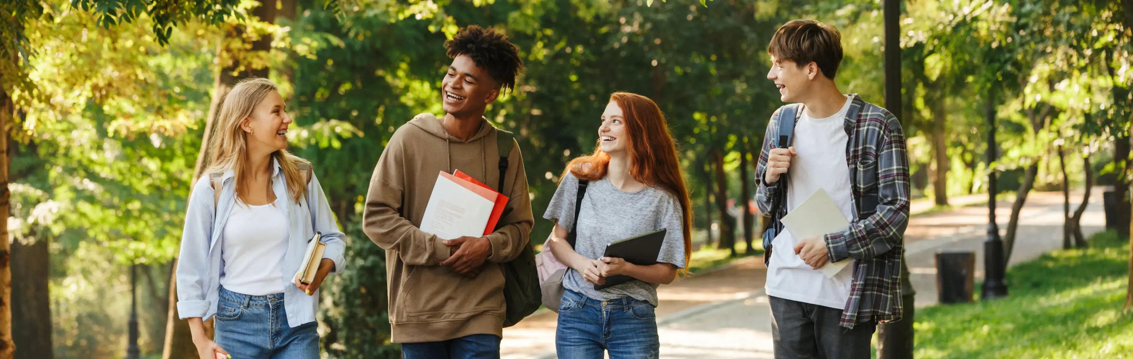 groupofhappystudentswalkingatthecampus
